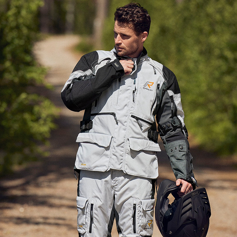 Guy wearing Rukka Trek-R suit in grey and orange